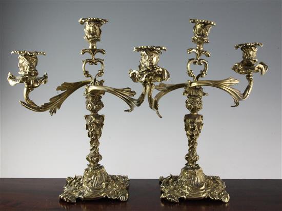A pair of 19th century French cast brass three light candelabra, 16in.